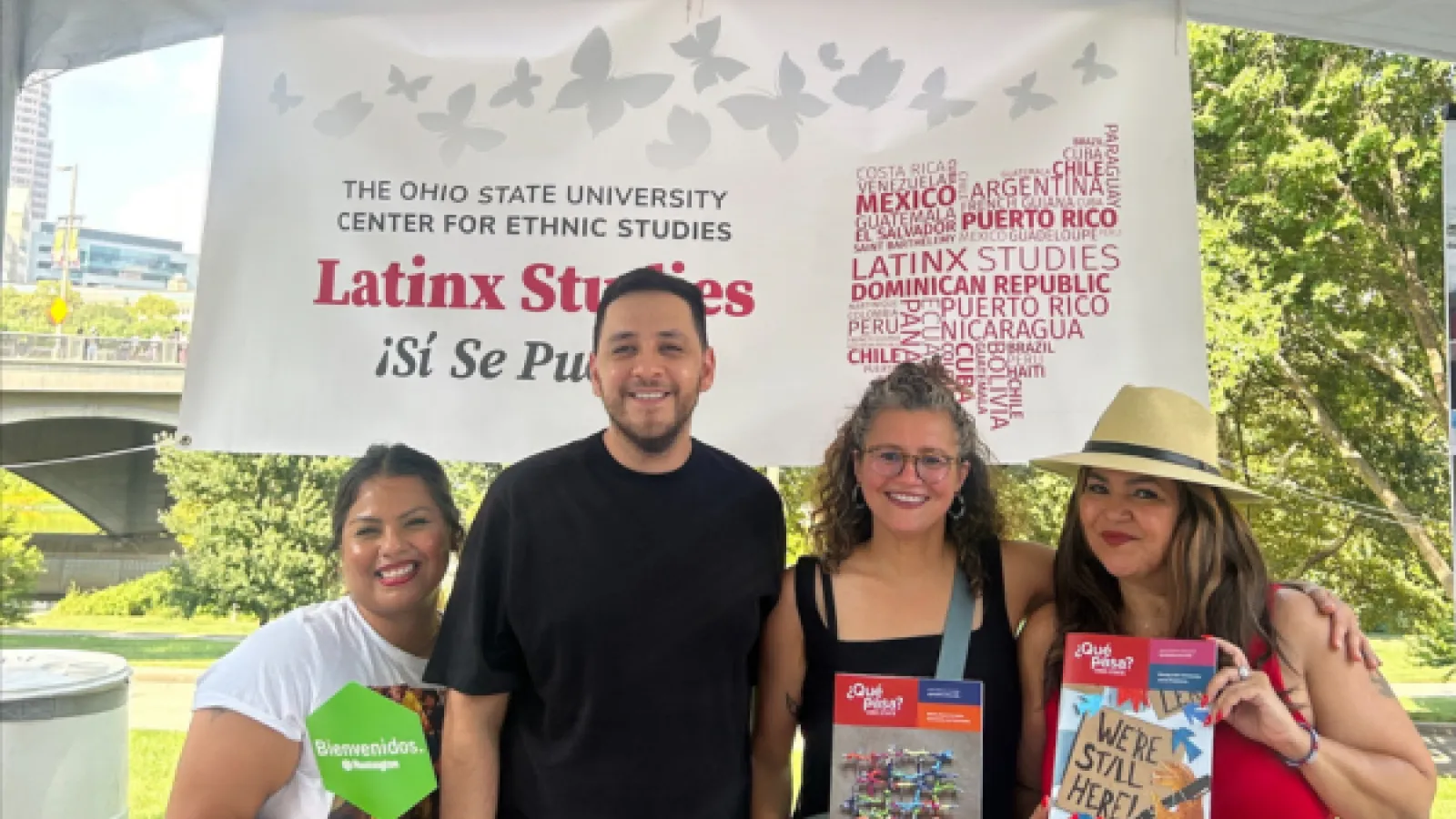 Four people standing in front of a banner that reads OSU Latinx Studies Program