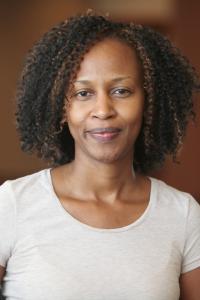 Njeri Kagotho in a white shirt